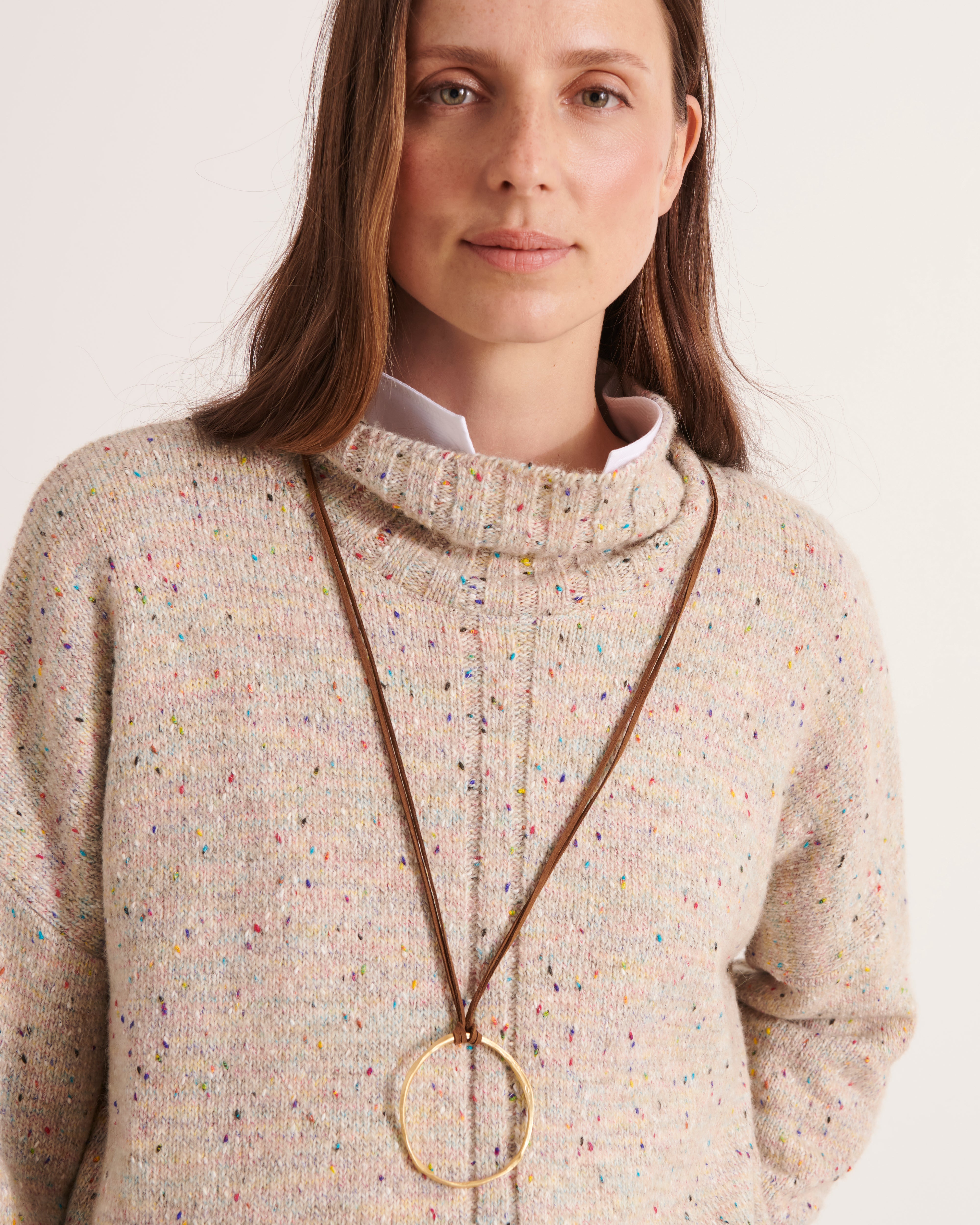 pull en maille chinée beige avec col montant