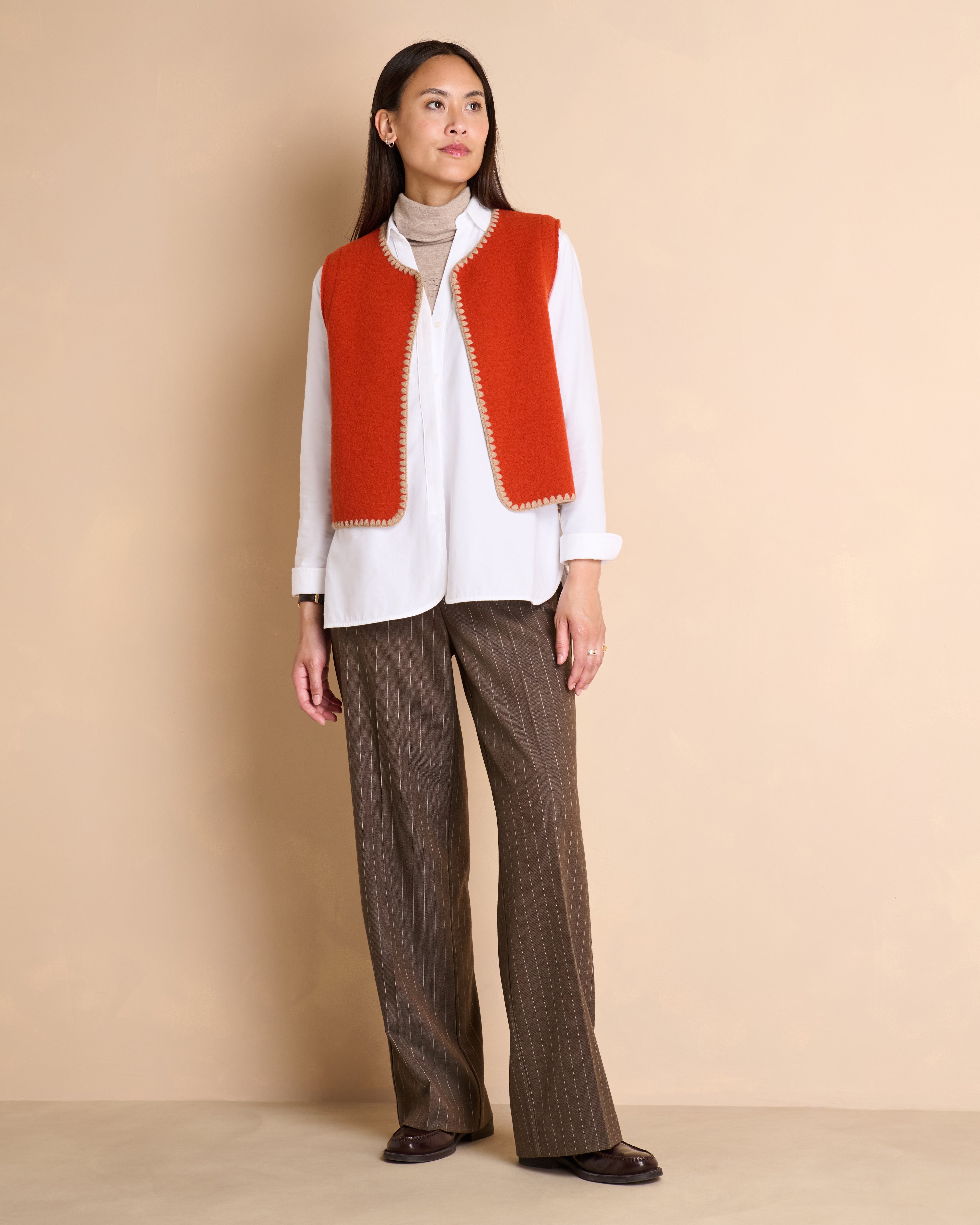 Gilet orange sans manches en laine bouillie