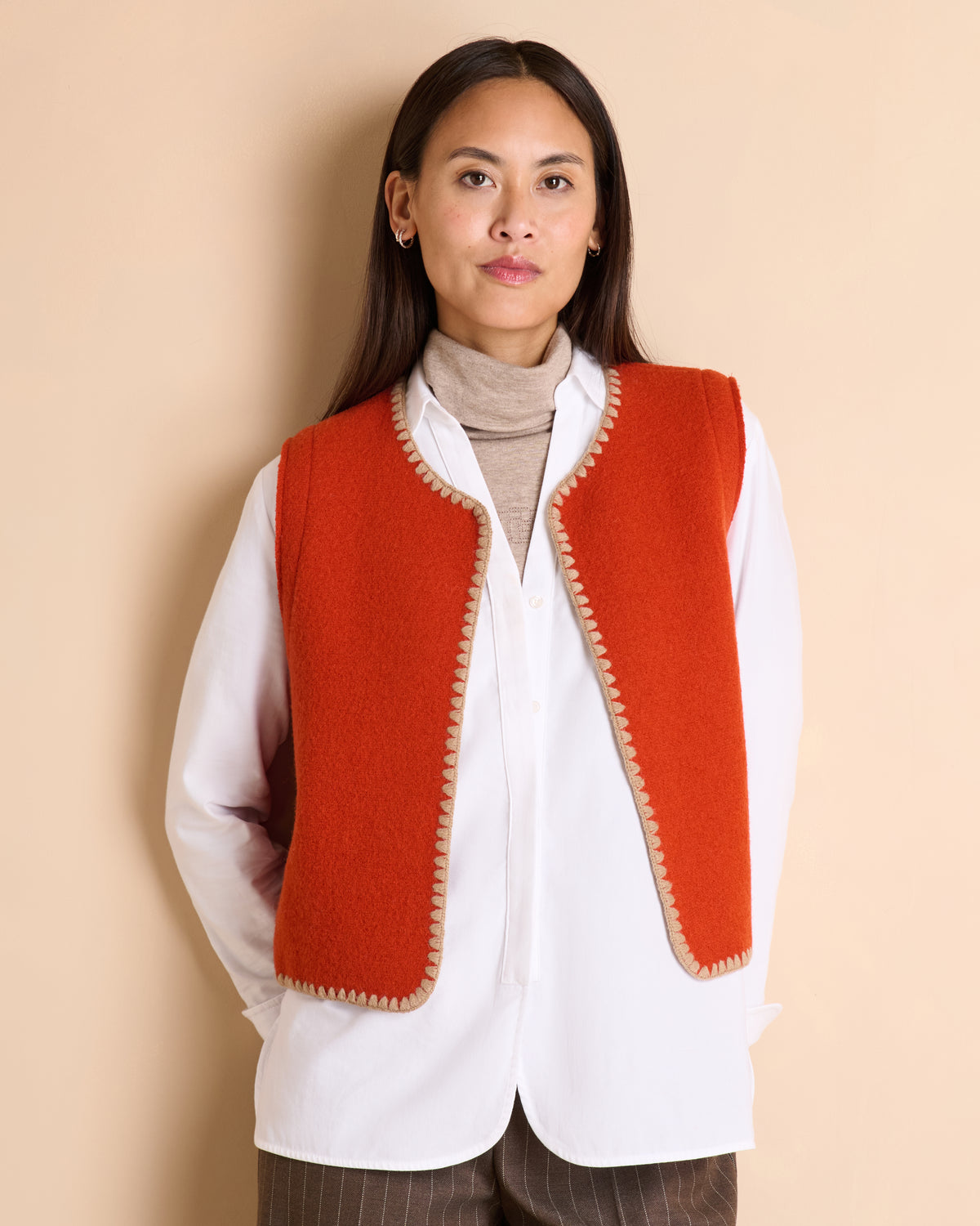 Gilet orange sans manches en laine bouillie