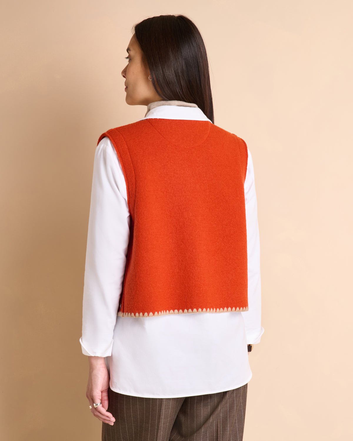 Gilet orange sans manches en laine bouillie