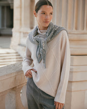 Pull blanc cassé col montant manches longues en laine