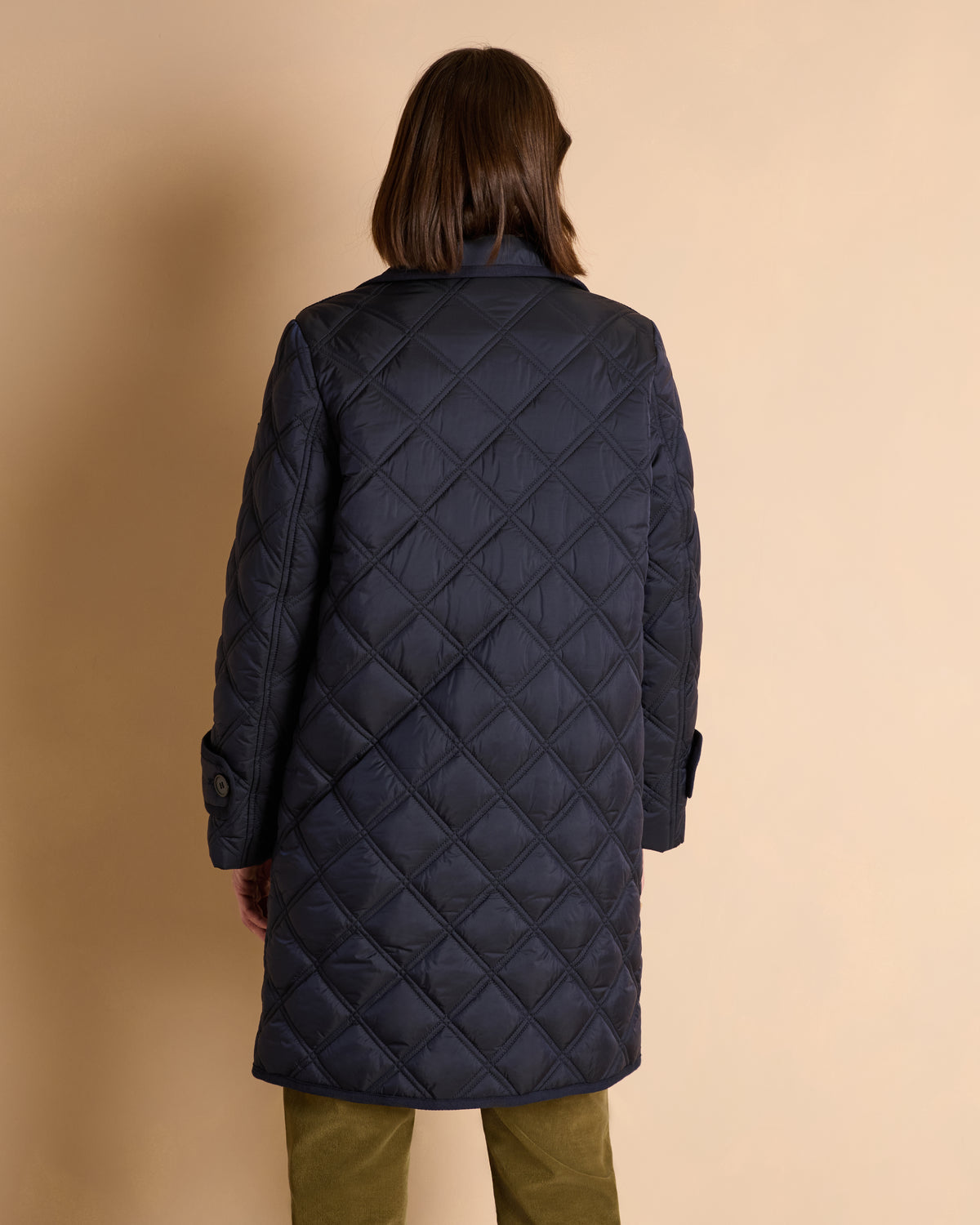 Manteau long bleu marine matelassé en polyester