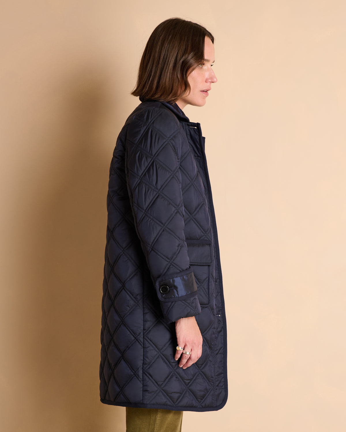 Manteau long bleu marine matelassé en polyester