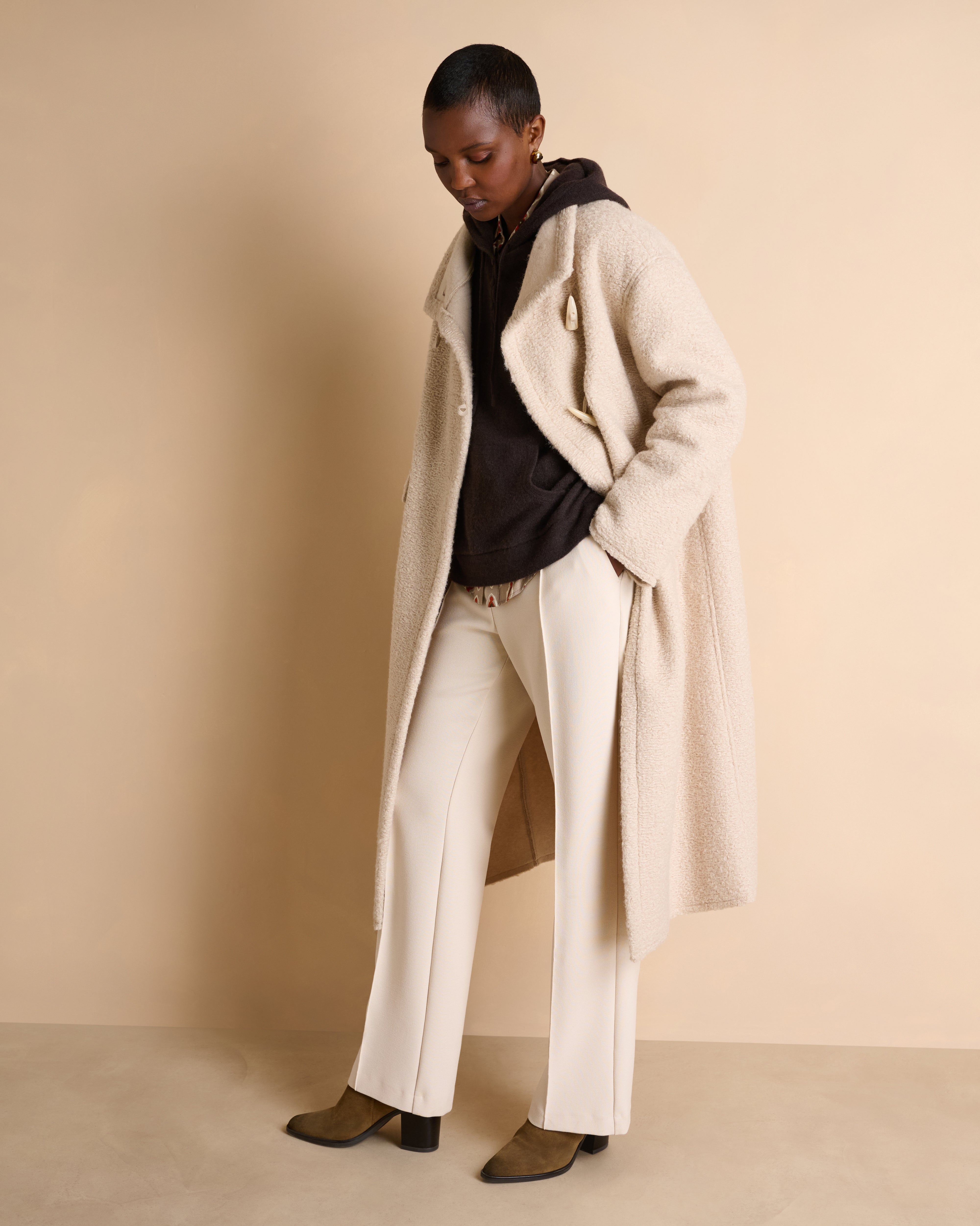 Manteau long beige col montant