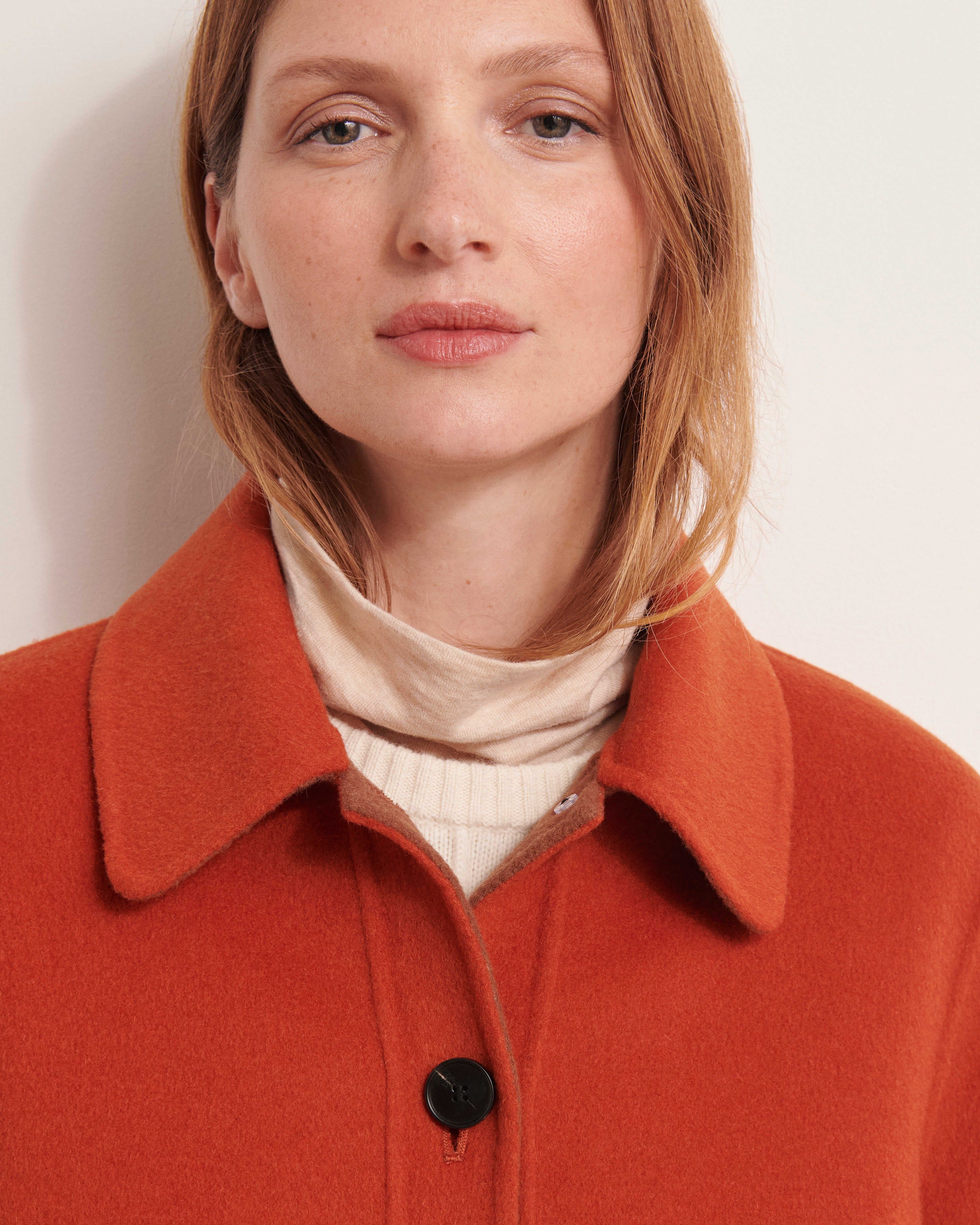 veste courte orange foncé en laine double face