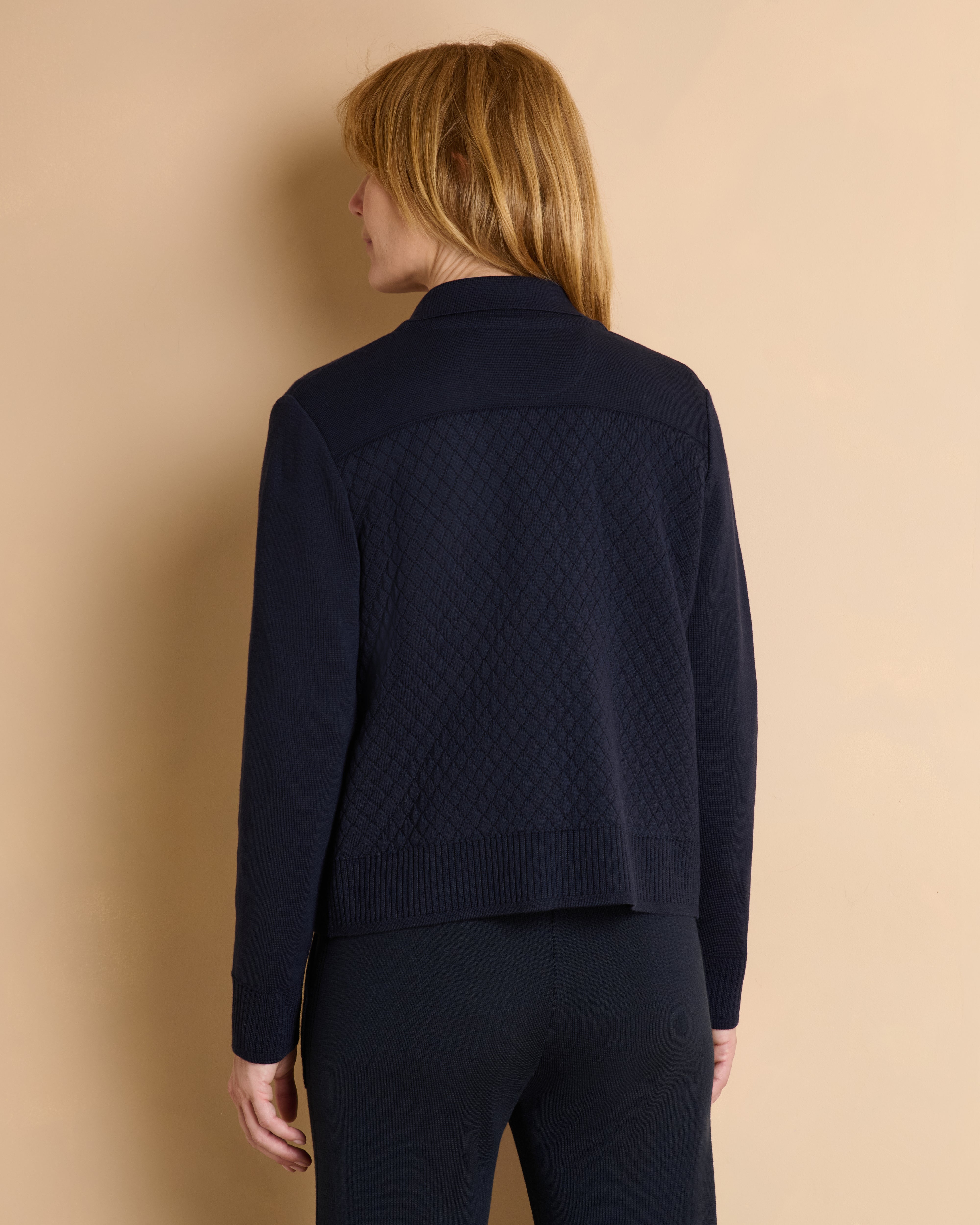 Veste bleu marine en laine boutonnée